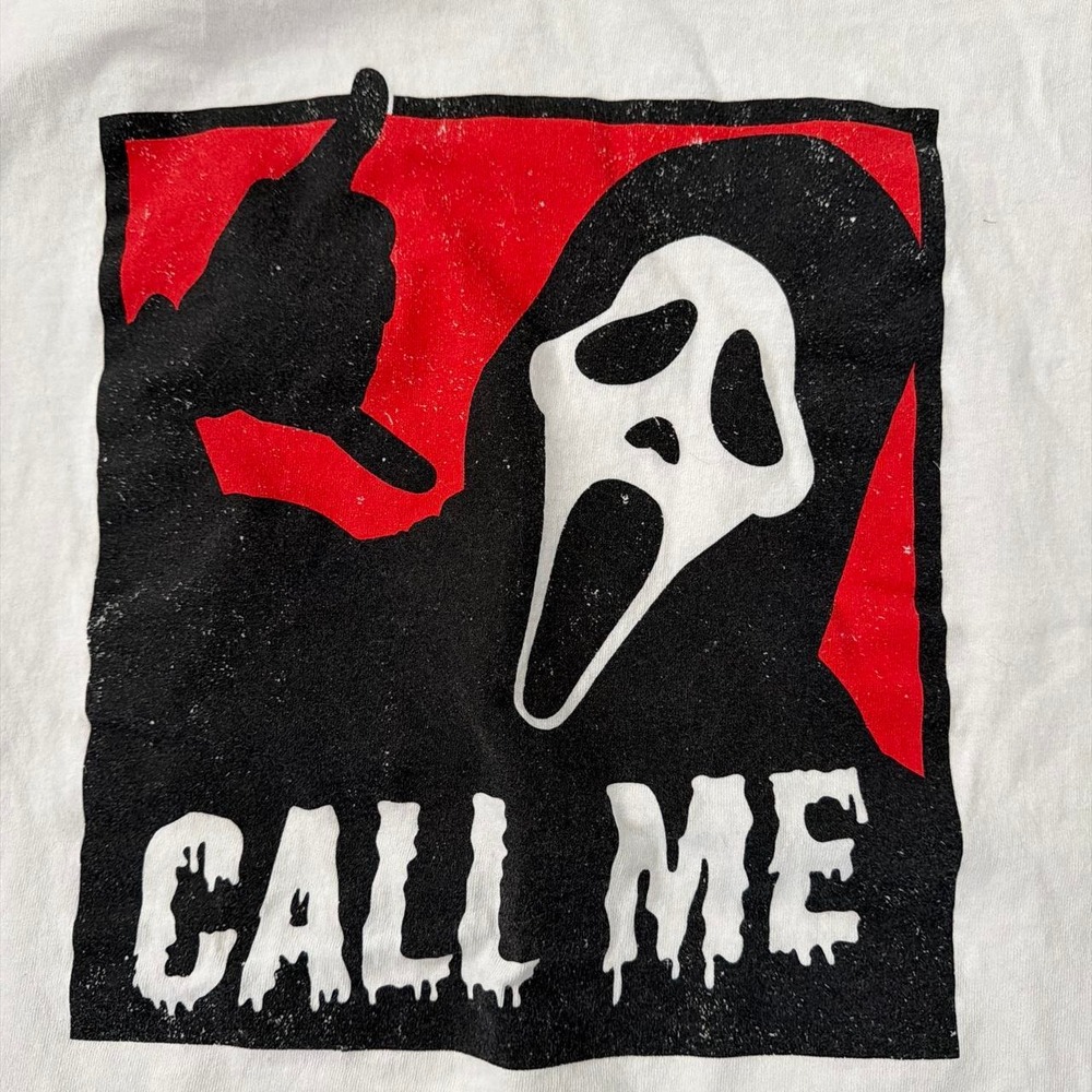 White Scream Call Me T-shirt with white ghost face graphic, black hand gesture